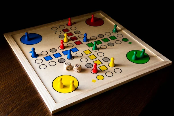 Playing Ludo Game Wooden Table — Stockfoto