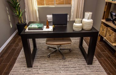 Home Office Wooden Desk With Laptop And Decorative Items