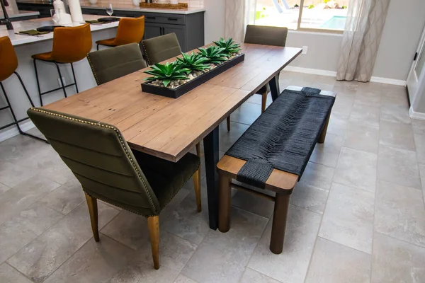 Kitchen Counter With Back Splash, Plant And Three Containers With Lids