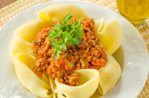 Lumaconi with ragout sauce — Stock Photo, Image