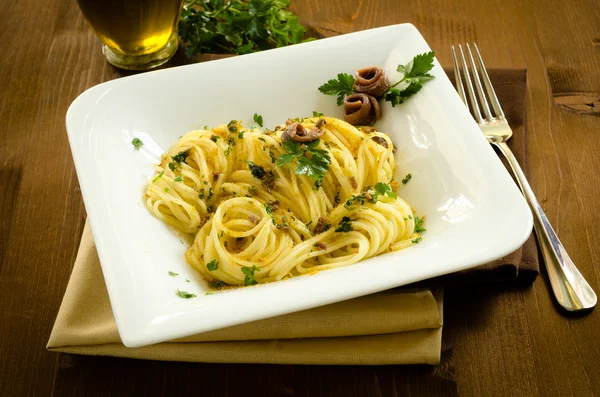 Espaguetis con bottarga y anchoas — Foto de Stock