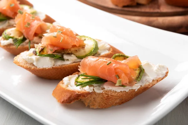 Dish Delicious Crostini Cheese Courgette Smoked Salmon Italian Appetizer — Stock Photo, Image