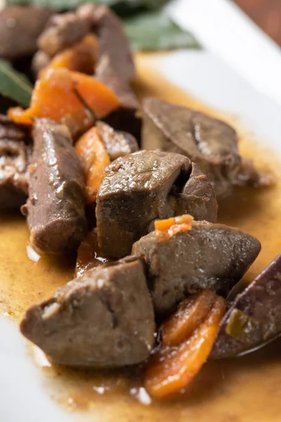 stewed meat with vegetables, close up