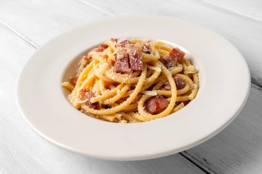 Close up of Delicious spaghetti with bacon and cheese