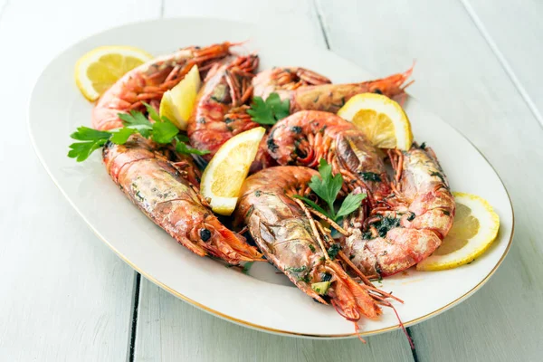 Dish of delicious roasted red prawns, italian food