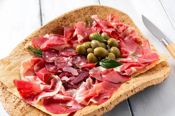 Tray of typical Sardinian cold cuts, italian food
