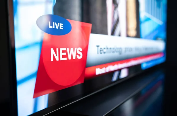 Tv news live broadcast and production concept. Breaking newscast on television. Screen close up of logo mockup, headline text and title banner graphic. Daily morning show. Misinformation, propaganda.