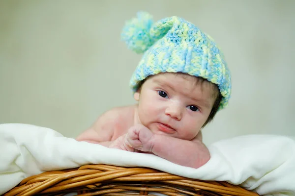 Newborn Infant Child Wearing Hat Lies Staring Camera — Foto Stock