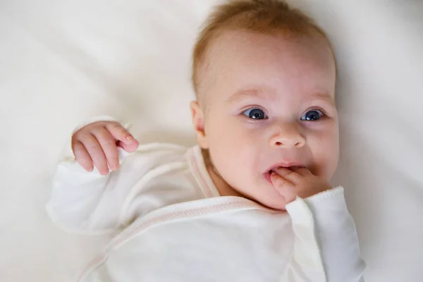 Little Newborn Baby Girl Lying White Clothes White Background — Zdjęcie stockowe