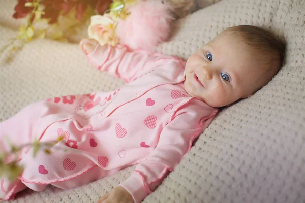 Little Newborn Baby Girl Lying Her Tummy Pink Clothes Beige — Stock fotografie