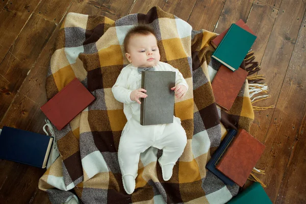 Baby Boy Lying Soft Surface Many Books Child Concept Early — Zdjęcie stockowe