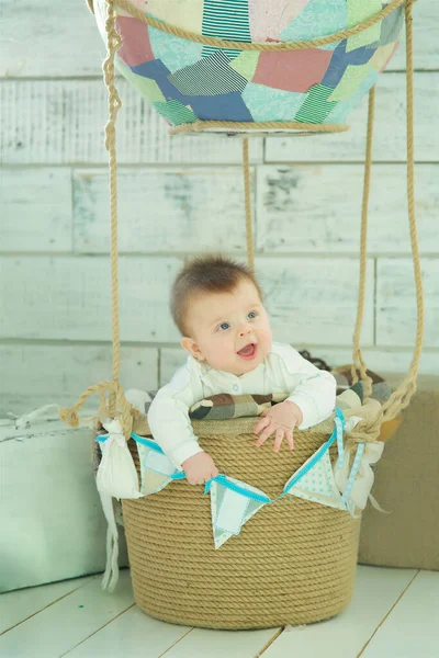 Small Baby Boy Lying Wicker Basket Concept Traveling Children — Zdjęcie stockowe