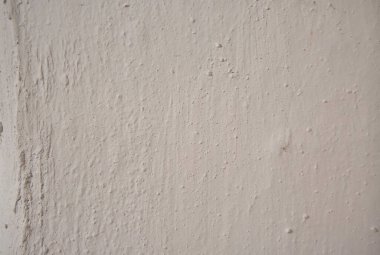 Beton ya da kil duvarlı kırsal evin eski yüzeyi. Arkaplan ve dokular.