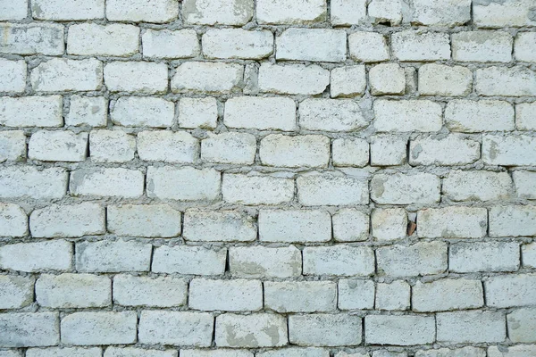 Beyaz tuğladan yapılmış eski bir duvar. Doku veya arkaplan.