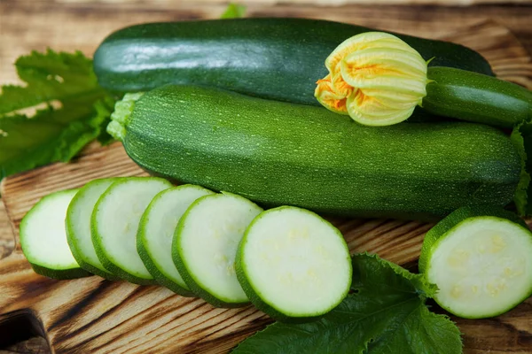 Raw Product Zucchini Lie Wooden Surface Table Ingredients Cooking Seasonal — Stock Photo, Image