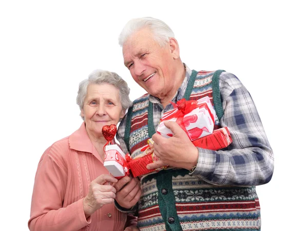 Grootvader en grootmoeder met geschenken — Stockfoto