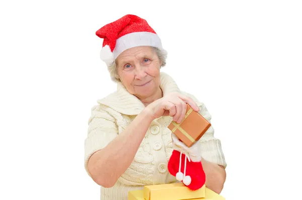 Büyükanne giyen Noel Baba şapkası