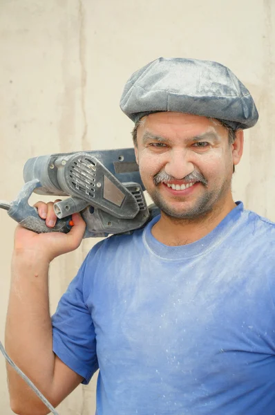 Lächelnder Bauarbeiter — Stockfoto