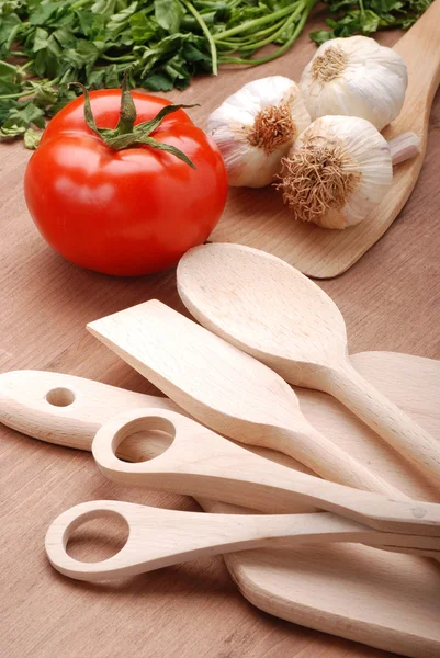 Kitchen utensils and vegetables — Stock Photo, Image