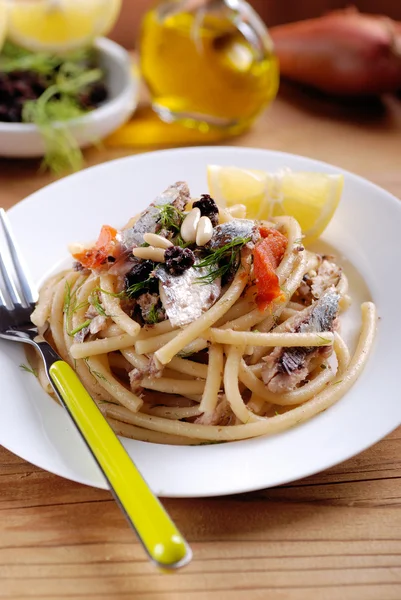 Macaroni with anchovies — Stock Photo, Image