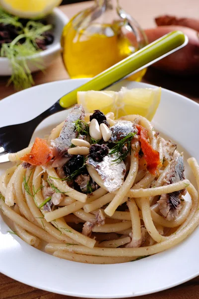 Macaroni with anchovies — Stock Photo, Image