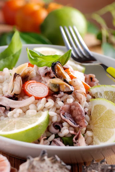 Barley salad with seafood — Stock Photo, Image