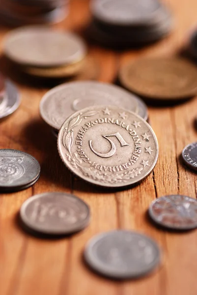 Coins on the wooden table — Stock Photo, Image