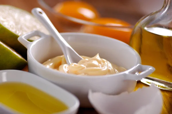 Mayonnaise sauce with ingredients — Stock Photo, Image