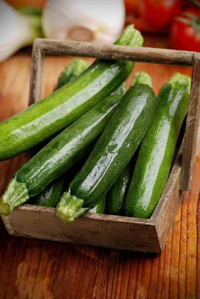 Green zucchini on the table — Stock Photo, Image