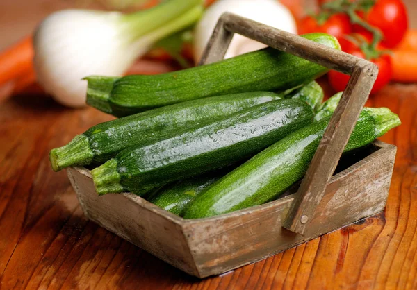 Green zucchini on the table — Stock Photo, Image