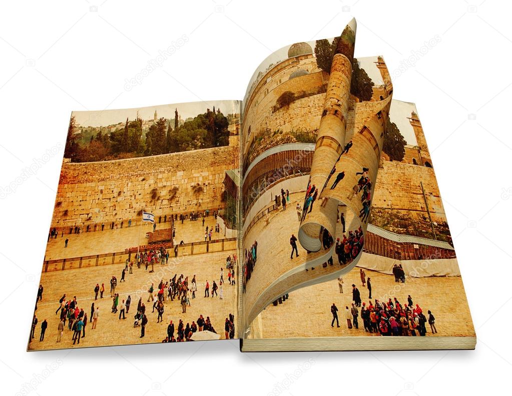 An opened old book with curl a picture Western Wall,Temple Mount, Jerusalem.Photo in old color image style.