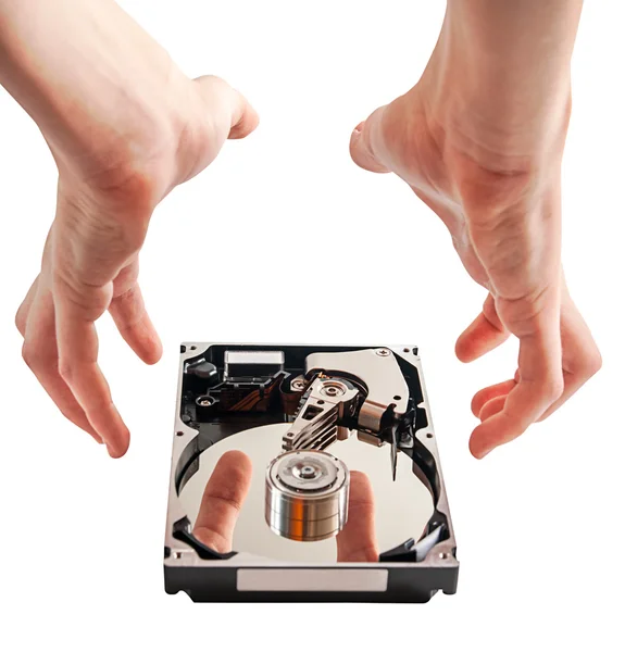 Hard drive details and hands, concept of data security — Stock Photo, Image