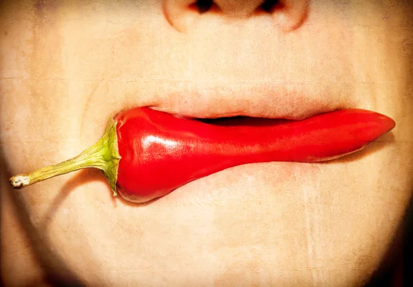 People with chilli in mouth, paper texture ストック画像