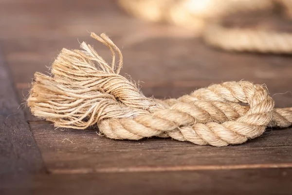 Rope on a wooden background — Stock Photo, Image