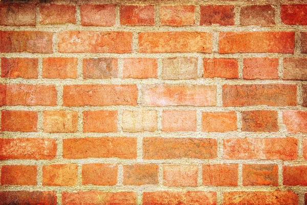 Deel van een stenen muur van baksteen, voor de achtergrond of textuur. — Stockfoto