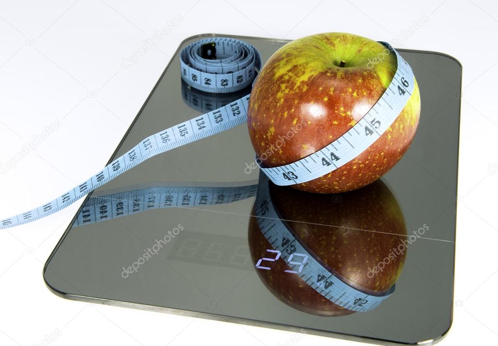 Apple on the scale.