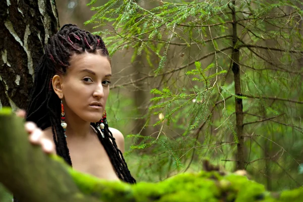 Portrait of a girl with dreadlocks on the background of birch tr — Stock Photo, Image