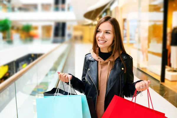 Attractive Happy Woman Colorful Shopping Bags Mall Blurred Background Free — Stockfoto