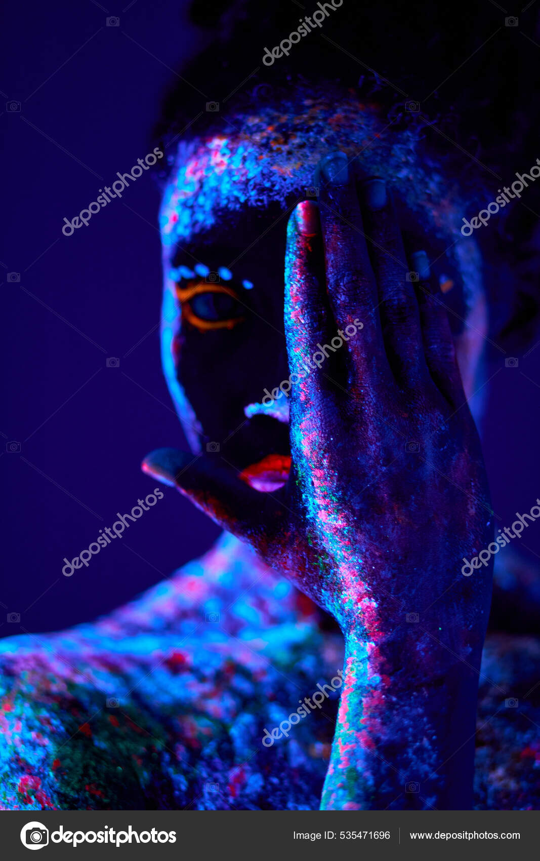 Young black female with fluorescent prints on skin, cosmic paint glowing on  neon lights Stock Photo by ©ufabizphoto 535471696