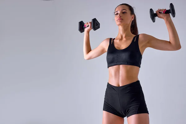 Portrait Of Fit Caucasian Lady In Black Sportswear Working Out With Dumbbells — Stock Photo, Image