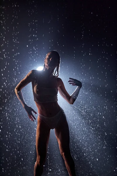 Seductive sexy caucasian woman in candid lingerie posing under rain, water drops — Stock Photo, Image
