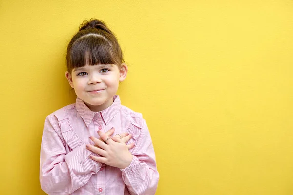 Beautiful Child Girl Pink Blouse Looking Camera Posing Isolated Yellow — Photo