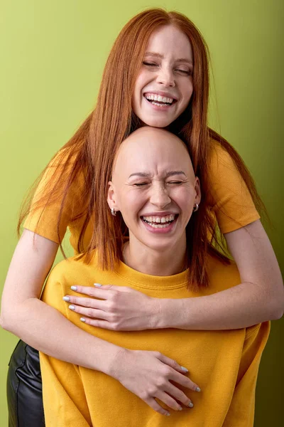 Two Diverse European Red Haired Bald Ladies Models Hugging Isolated — Photo