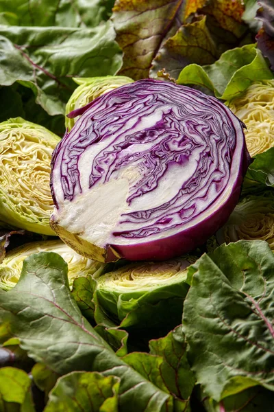 sliced red cabbage from top. Close up of an intricate pattern of purple color cabbage after slicing it. Fresh vegetable concept. flat lay