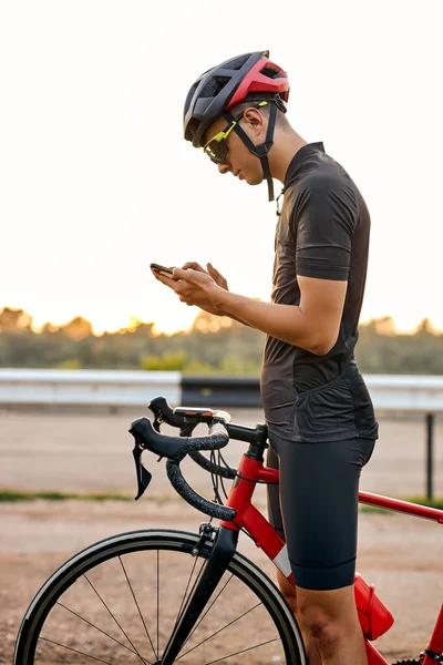 Cyclist Riding Bike Text Messaging Cellphone People Sports Active Lifestyle — Stok fotoğraf