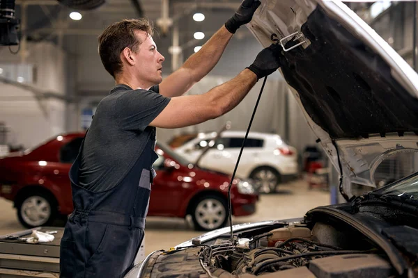 Professional Auto Mechanic Working Car Hood Repair Garage Closing Opening — Zdjęcie stockowe