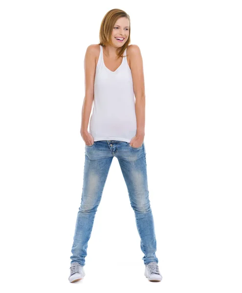 Full length portrait of smiling teenage girl looking on copy spa — Stock Photo, Image