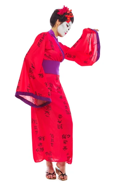 Full length portrait of geisha dancing isolated on white — Stock Photo, Image