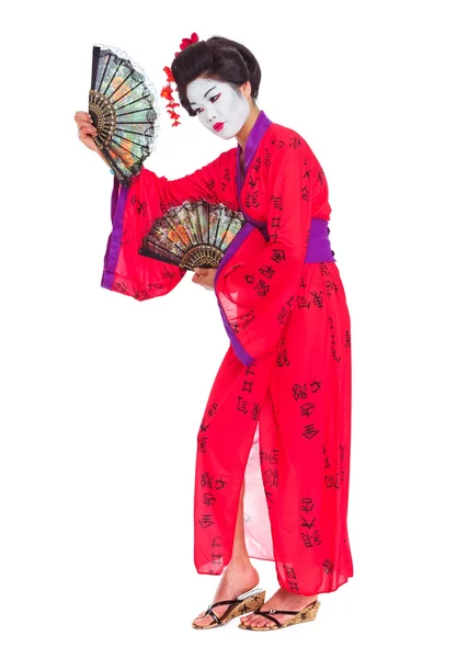 Full length portrait of geisha dancing with fans isolated on whi — Stock Photo, Image