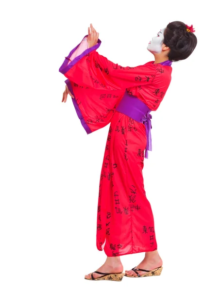 Full length portrait of geisha dancing isolated on white — Stock Photo, Image